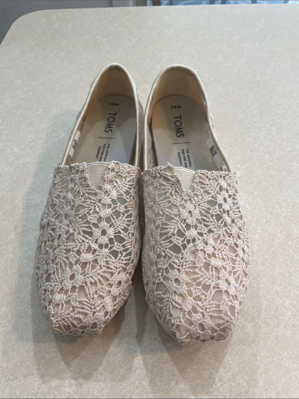 TOMS Women’s Crochet Slip-On Flats in Cream